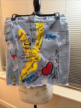 Light Blue Graphic Denim Mini Skirt with Yellow & Red Accents
